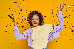 Happy woman with confetti